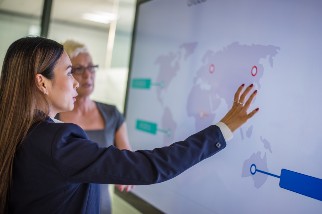 Closeup of businesswomen talking in a conference room