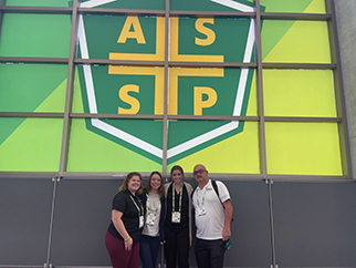 Slippery Rock University students under ASSP logo at Safety 2021 in Austin